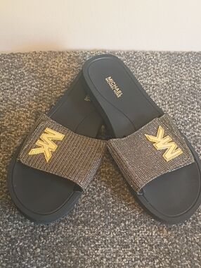 Michael Kors Black Slide Sandals with Gold MK Emblem